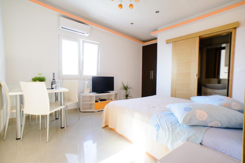 Lara Apartments Makarska Habitación foto